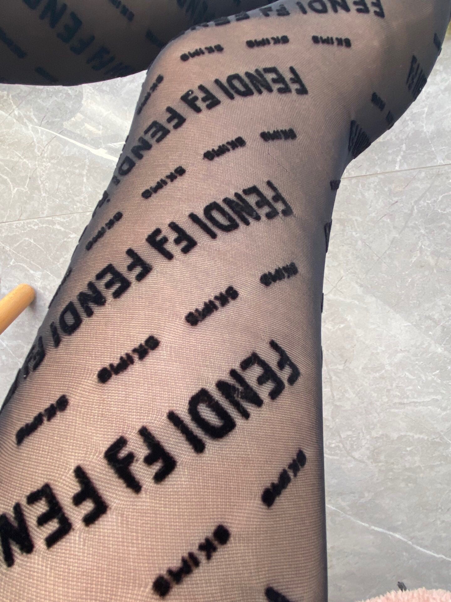 Fendi haute couture 3D letter black flocked pantyhose
