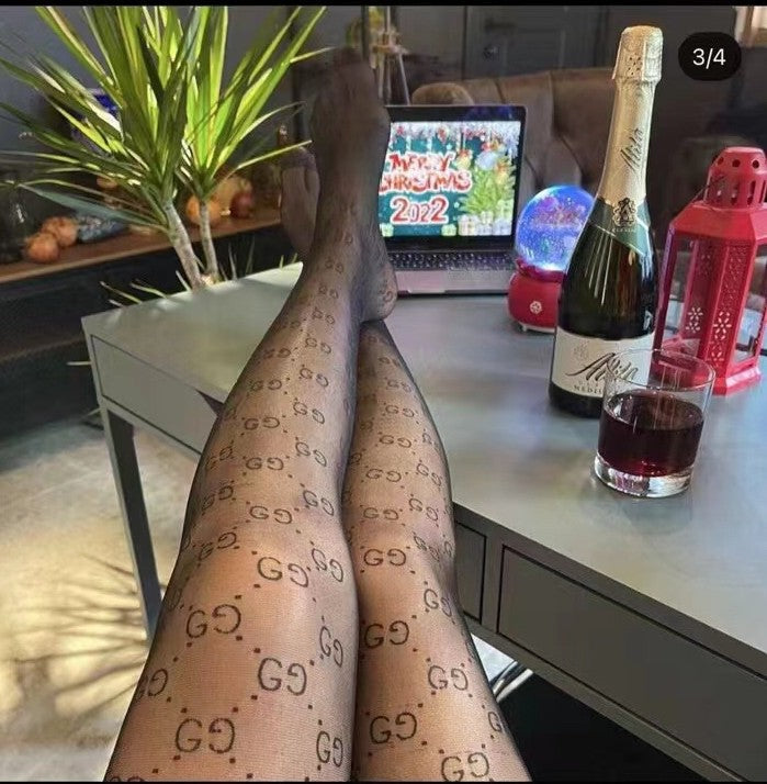 GG logo haute couture semi-transparent black flocked pantyhose