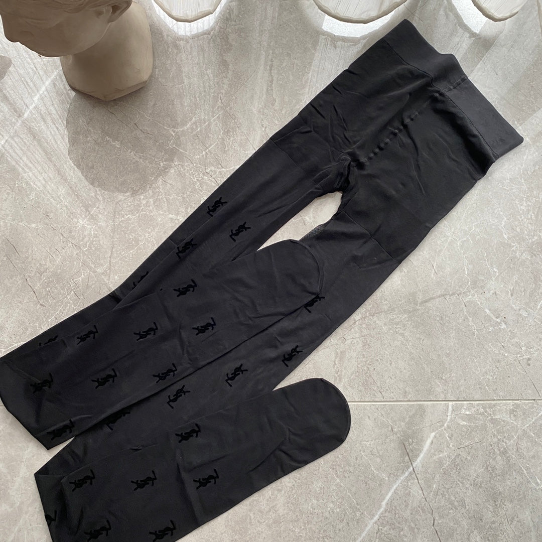 YSL flocked logo haute couture black pantyhose