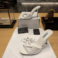 Prad 26s Open Toe Mules 100mm In Ivory White Patent Calfskin With Logo
