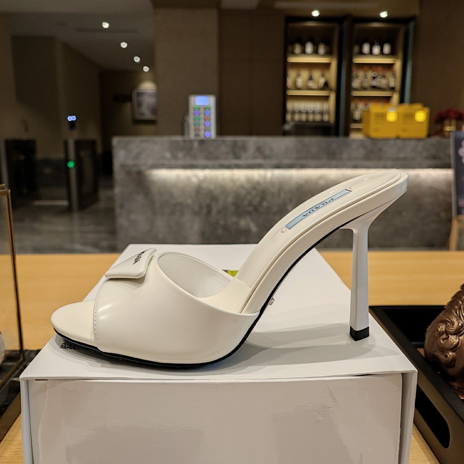 Prad 26s Open Toe Mules 100mm In Ivory White Patent Calfskin With Logo