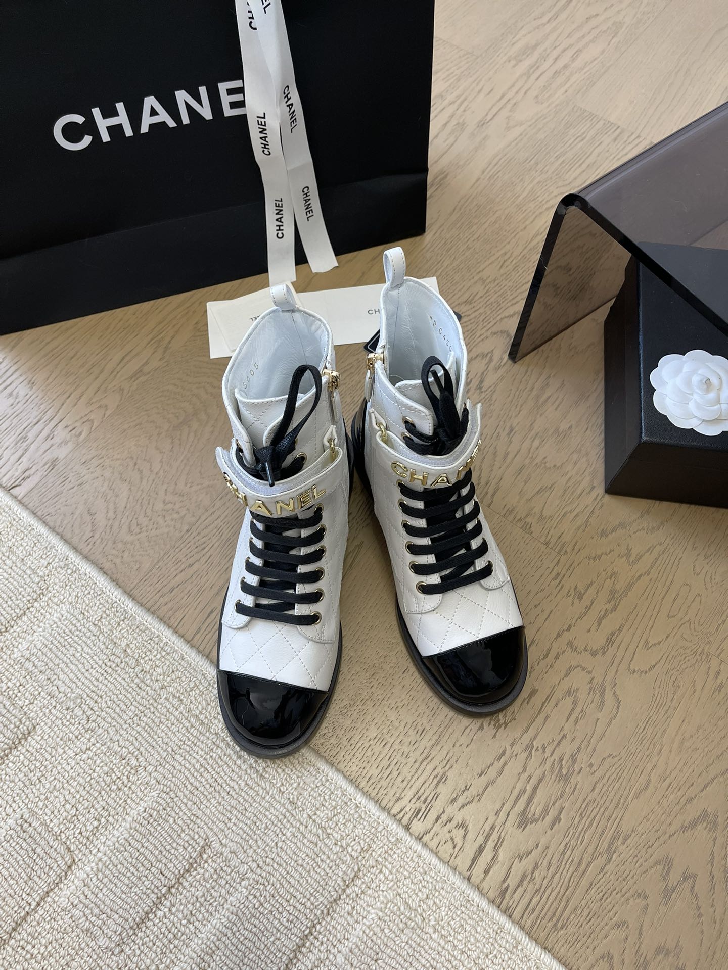 CHANEL ALPHABET MARTIN BOOTS IN WHITE LAMBSKIN