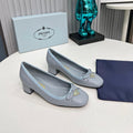 Prad 26s Round Toe Pumps Block Heel 40mm In Light Blue Calfskin With Bow